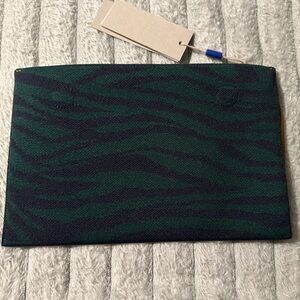 Rothy's Green and Black Zebra Print Essential Pouch with magnet.